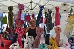 Jenny Jones and her colourful display of scarves and bags