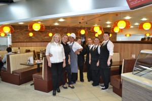Some of the staff and owners of Benson's Pantry in their newly refurbished seating area.